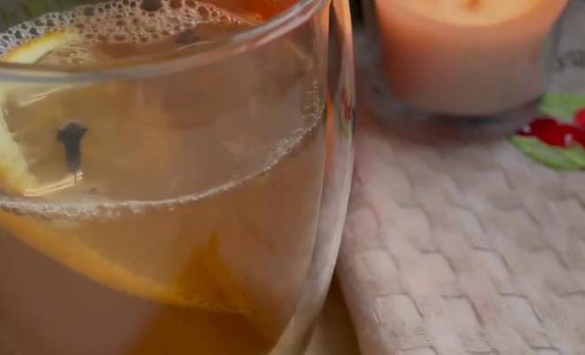 Рождественский напиток с яблочным соком, апельсином и лимоном рецепт