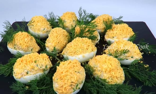 Закуска салат Мимоза фаршированные яйца на Новый год рецепт