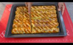 Выпечка пирога из слоеного теста с фаршем в духовке